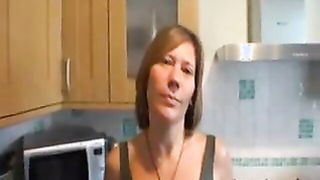 Brunette MILF fingering in kitchen full scene