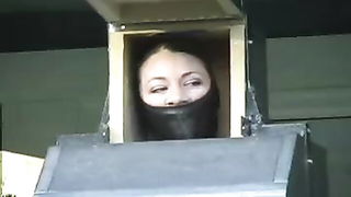 Masked Asian babe in cage free porn